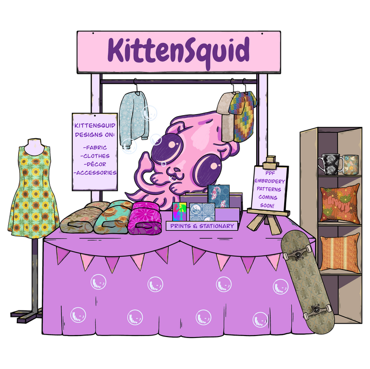 KittenSquid's Undeads Artist Alley stall. This shop is run by KittenSquid, and clicking the image will take you to the store. The stall has a variety of colourful fabrics and crafts, and is being run by a giant squid!