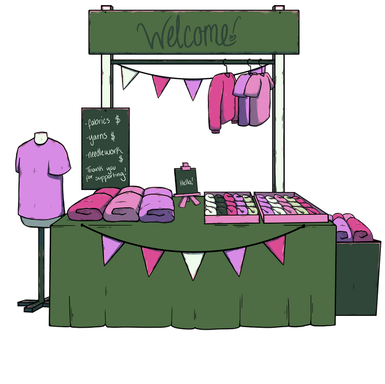 Green stall covered in pink and purple yarns. Behind the stand there is a rack of t-shirts.